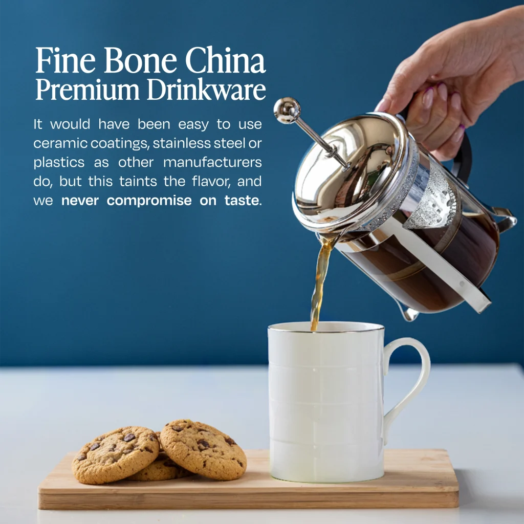 A hand pours coffee from a French press into a fine bone china mug beside a wooden board with chocolate chip biscuits. Text on the image reads: “Fine Bone China – Premium Drinkware. It would have been easy to use ceramic coatings, stainless steel or plastics as other manufacturers do, but this taints the flavour, and we never compromise on taste.”